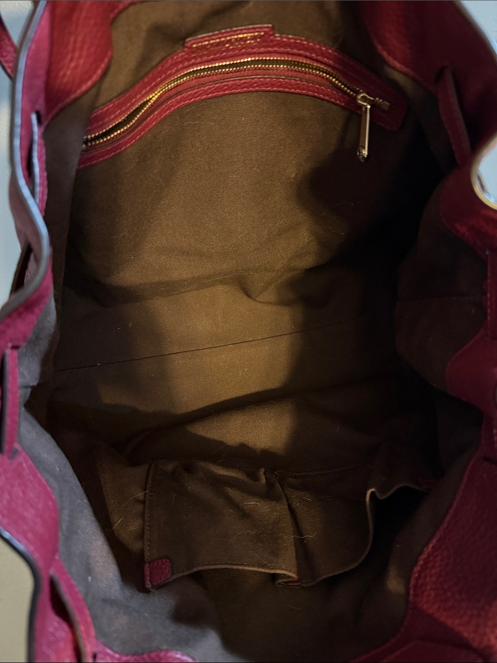 Henri Bendel tote bag features a pebbled texture and gold-toned hardware. - Picture 9 of 11
